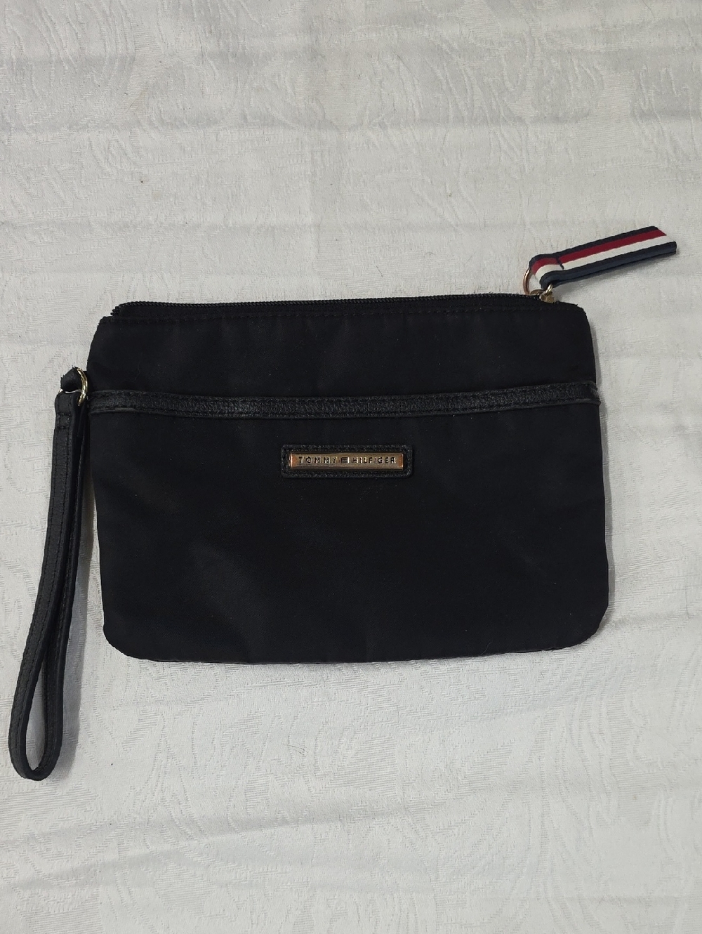 Tommy Hilfiger Black Wristlet with Signature Flag Pull